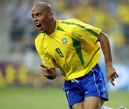 Brazil's Ronaldo celebrates following his goal against Turkey during their World Cup Finals match in Ulsan, South Korea, June 3, 2002. 