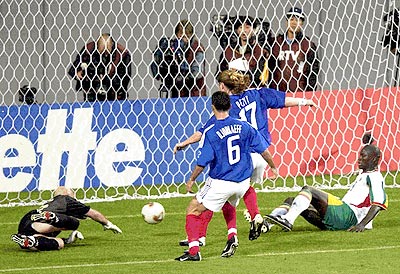1st round - France v. Senegal - Senegal's Pape Bouba Diop scrambles home the winner
