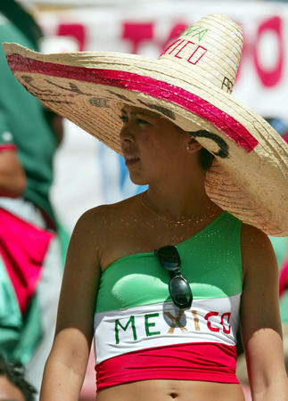 A Mexican fan wears a large sombrero and waits for the start of the Group G match in the World Cup finals between Croatia and Mexico in Niigata June 3, 2002