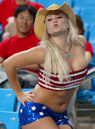 A US fan dances prior to the World Cup quarter-final match between USA and Germany in Ulsan, June 21, 2002