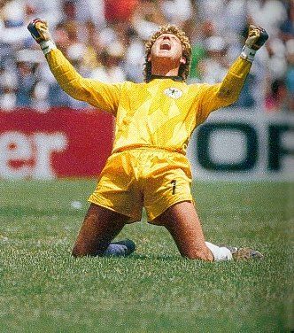 West Germany have equalized to 2-2 with nine minutes to go having been 2-0 behind. Goalkeeper Toni Schumacher celebrates the goal. He was voted best goalkeeper of the tournament, but failed to live up to his high standards in the final itself. Argentina scored the winning goal just three minutes later.