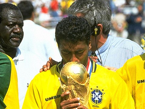 Romario kissing the trophy Brazil had been waiting to get their hands on. They had won the Jules Rimet Cup permanently in 1970, but had never won this new trophy which was launched for the 1974 World Cup. 